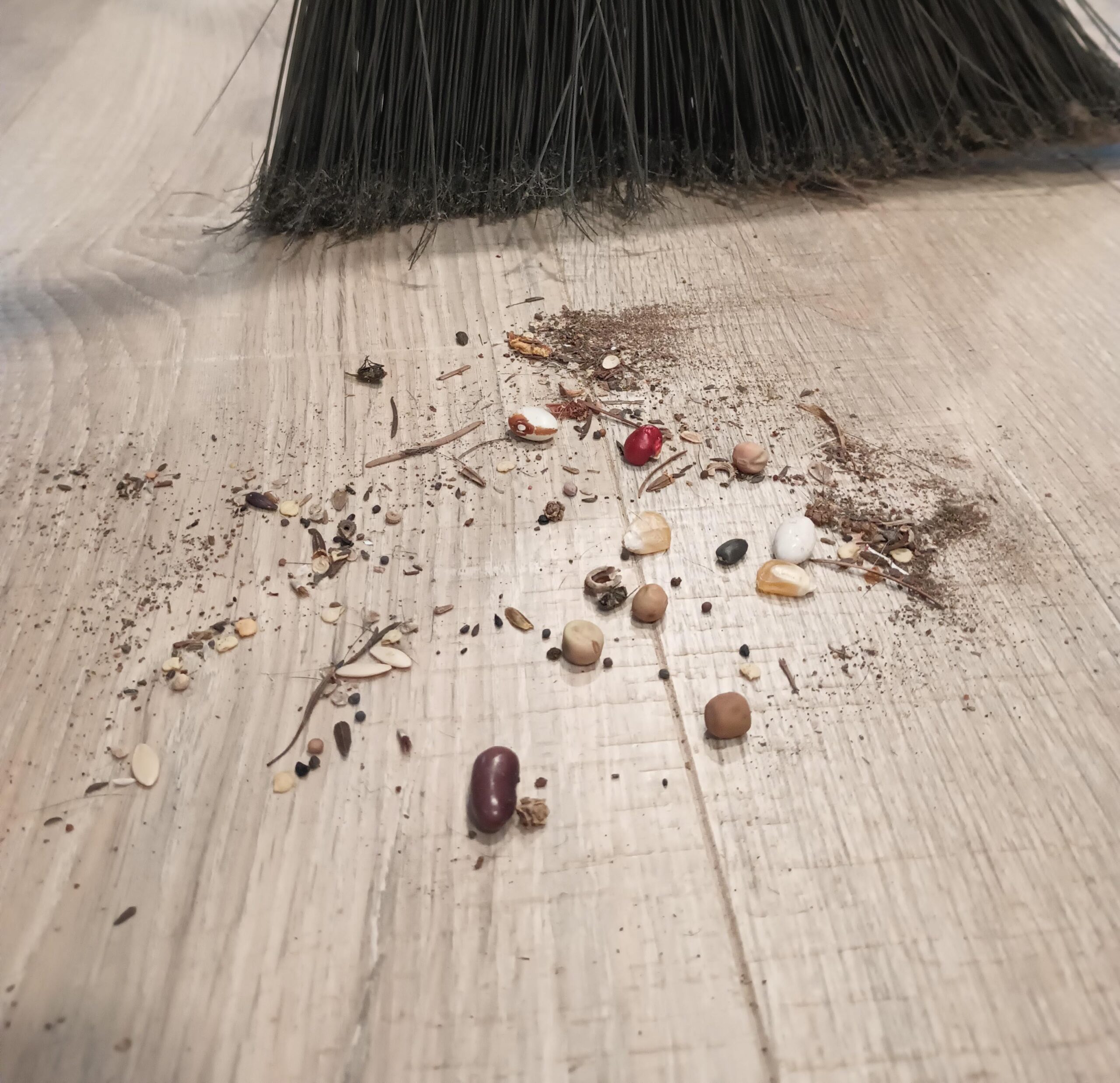 broom and floor sweeping pile